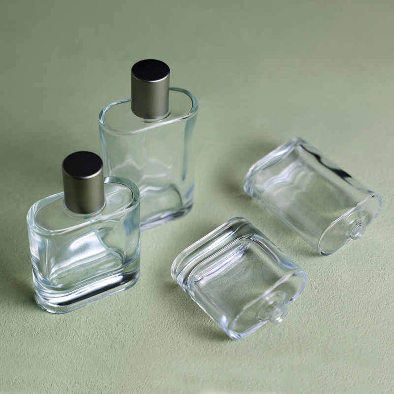 Luxury Rectangular Large Capacity Transparent Middle East Arabic 50 Ml 100 Ml Glass Perfume Bottle Spray Bottle with Black Cap